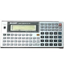 Ordinateur de poche SHARP PC-1402 BASIC testé en l'état LCD défaut vis...