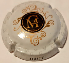 Capsule de Champagne Mulette Blanc, or, centre noir N°21