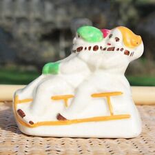 Ancienne tirelire à casser luge & enfants en faïence Esdeve Sarreguemines