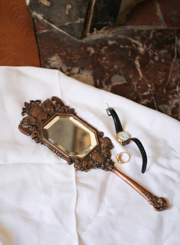 Miroir face main - à, bronze
