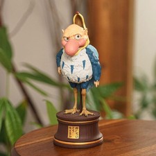 Figurine statue homme héron