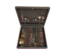 Ménagère en bronze nickelé et bois précieux (44 pièces)