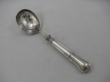 Cuillère à saupoudrer