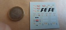 decals43.com décalcomanie 1/43 Combinaison de pilote + podium F1