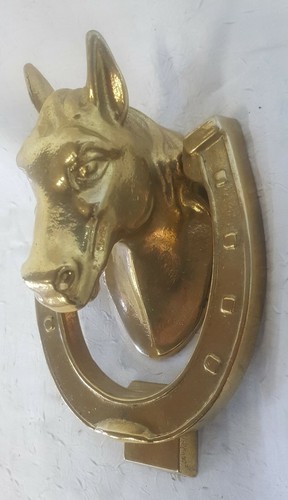 Heurtoir représentant un - heurtoir,