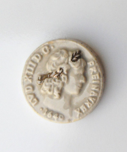 Fève pièce louis d - -,