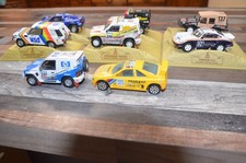 lots rallye dakar-PAGERO-Porsche 911- 405 T16-Range Rover-megane-VOLKSWAGEN -wrc