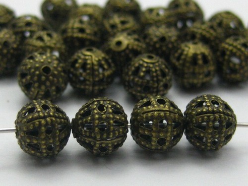 Perles 8mm filigrane bronze - 10,
