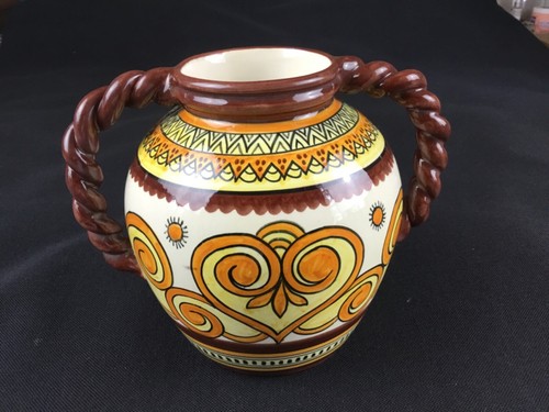 Vase anses torsadées - à,