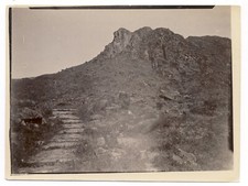 Vintage sepia photo - arid mountain with stone steps path