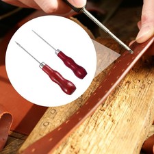 Aiguille à coudre en cuir