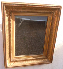 Miroir bois sculpté doré