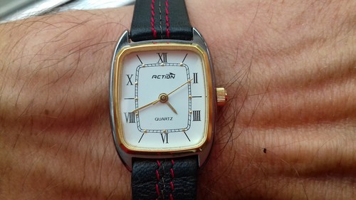 Action 0011 561 montre - action,