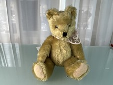 Ancien ours en peluche de