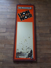 ANCIENNE  PLAQUE  EMAILLEE.  LION  NOIR.