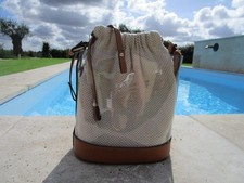 Sac seau cuir fin, toile et transparent porté bandoulière