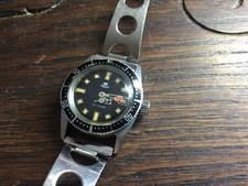 REXA- Plongeuse à dato patine coquille d’œuf sur bracelet Gainsbourg- vers 1970-