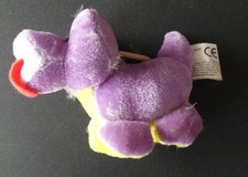 Dinosaure peluche à suspendre. Violet et jaune. 10 x 8 cm