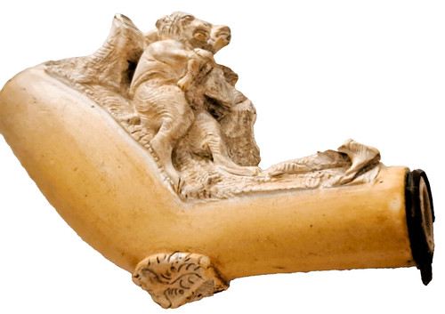 Partie pipe sculptée en - partie,
