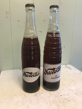 Two FULL 16 Ozs NESBITT’S