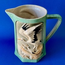 Ancien pichet Cigognes 1009 St