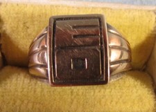 Bague chevalière  vintage  en argent et or  poinçon tête d'aigle/sanglier 6g