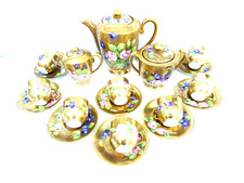 Service à café 1900 porcelaine de Limoges, dorure à l'agate: Roses et Violettes