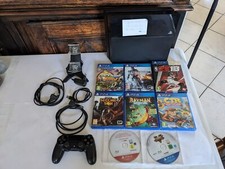 PS4 500GO avec 8 jeux et 1 manette, tout fonctionne. La console aurait besoin d'