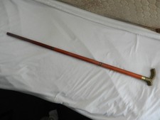 Canne à système fiole avec pommeau casse-tête en bronze