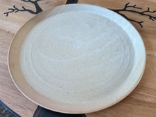 très grand plat rond environ