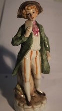 Personnage figurine en porcelaine  parfait état