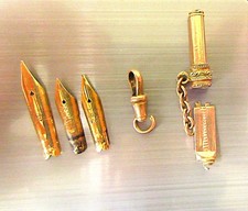 OR 18 CARAT S TETE AIGLE PLUMES FERMOIR DEBRIS CLE DE MONTRE et 4 PLUMES 4,46 gr