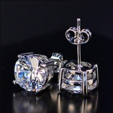 Clous solitaire diamant blanc