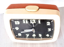 ANCIEN REVEIL   JAZ  MODELE DISCRETO   FONCTIONNE   ORANGE ET BLANC 12X10CM