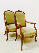 deux fauteuils haut dossier à