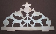 Fronton de comtoise découpé