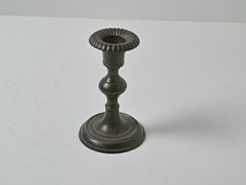 Bougeoir en métal patiné