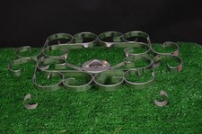 ANCIEN DESSOUS CHAUFFE PLAT EN INOX FORGE 