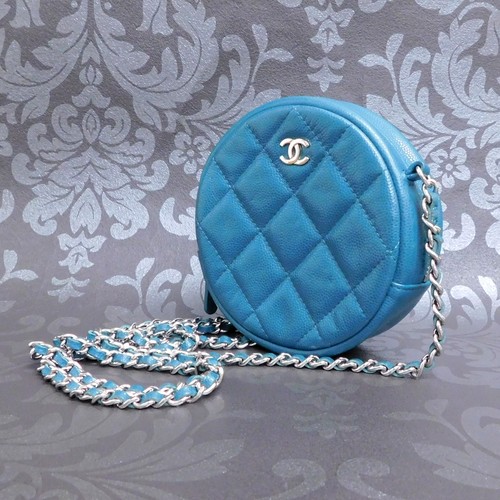 Sac bandoulière rond - à,