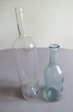 Lot de 2 bouteilles vides en verre