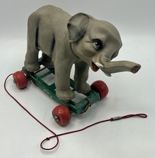 ELEPHANT sur roulettes - Jouet à tirer en plastique - 1960/1970's? - Bon état