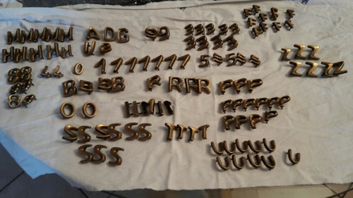 Lot 110 lettres bronze - 110, en