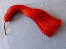 Vends plumet crin écarlate pour shako et recherche cordon (voir photo)