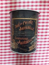 Boîte à thé de la Chocolaterie Aiguebelle en tôle lithographiée