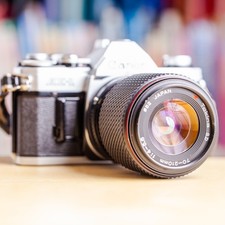 Canon AE-1 + Zoom 70-210mm