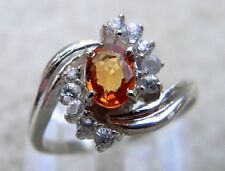 BAGUE ARGENT .925,  SERTIE d'un SAPHIR ORANGE de 0,66 cts + SAPHIRS BLANCS
