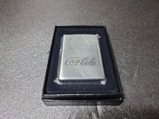 Vitrine de collection Zippo Coca Cola en parfait état