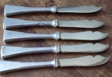 12 Couteaux argent massif et