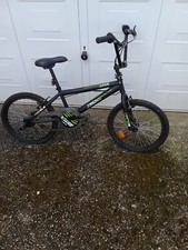 VELO BMX NOIR AVECT ETIQUETT JAUNE FLUO