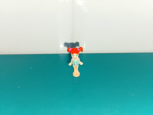 Polly pocket figurine doll